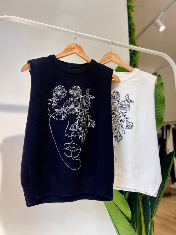 Gilet in maglina con volto ricamato