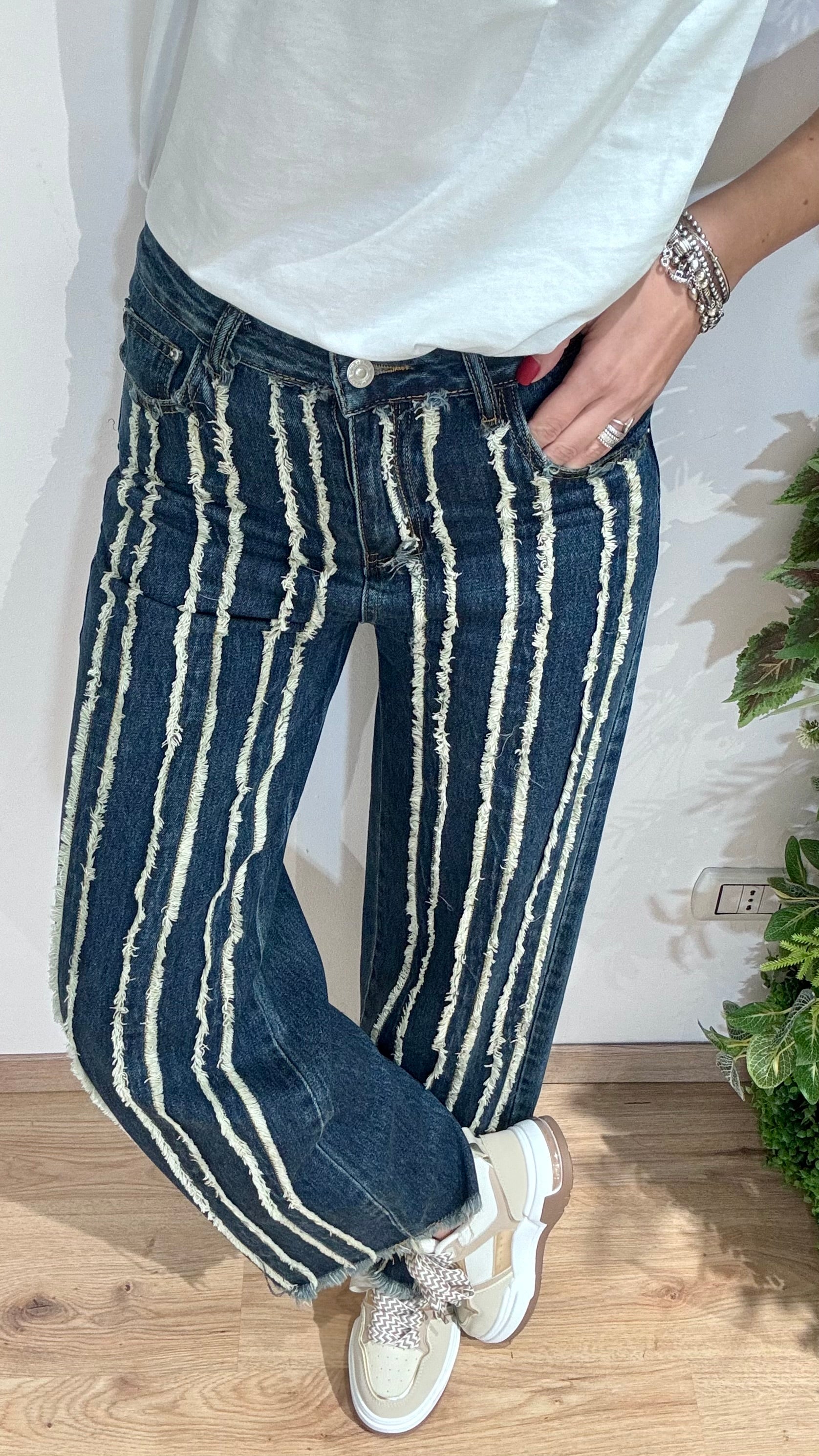 Jeans palazzo sfilacciati