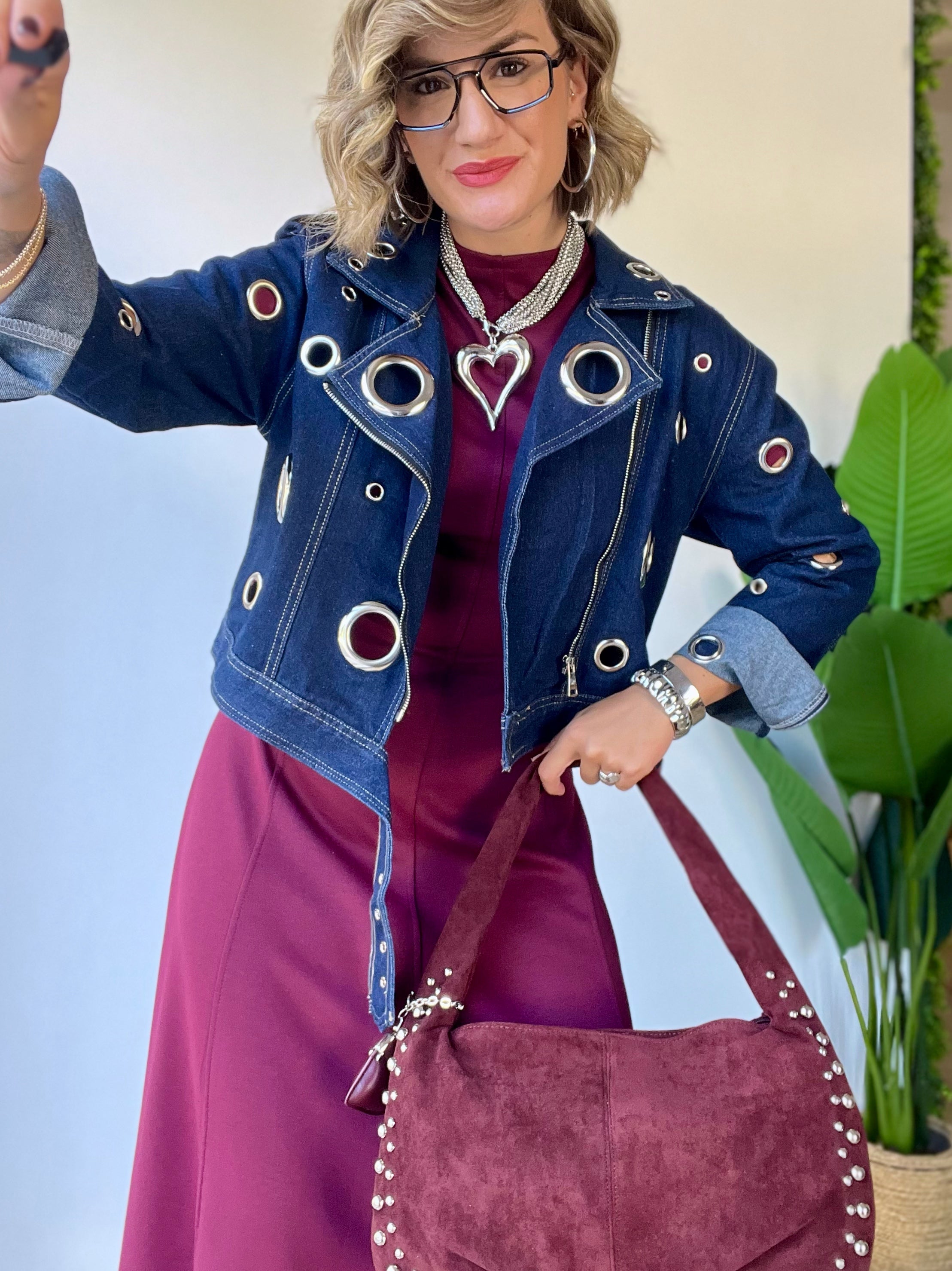 Borsa scamosciata con borchie