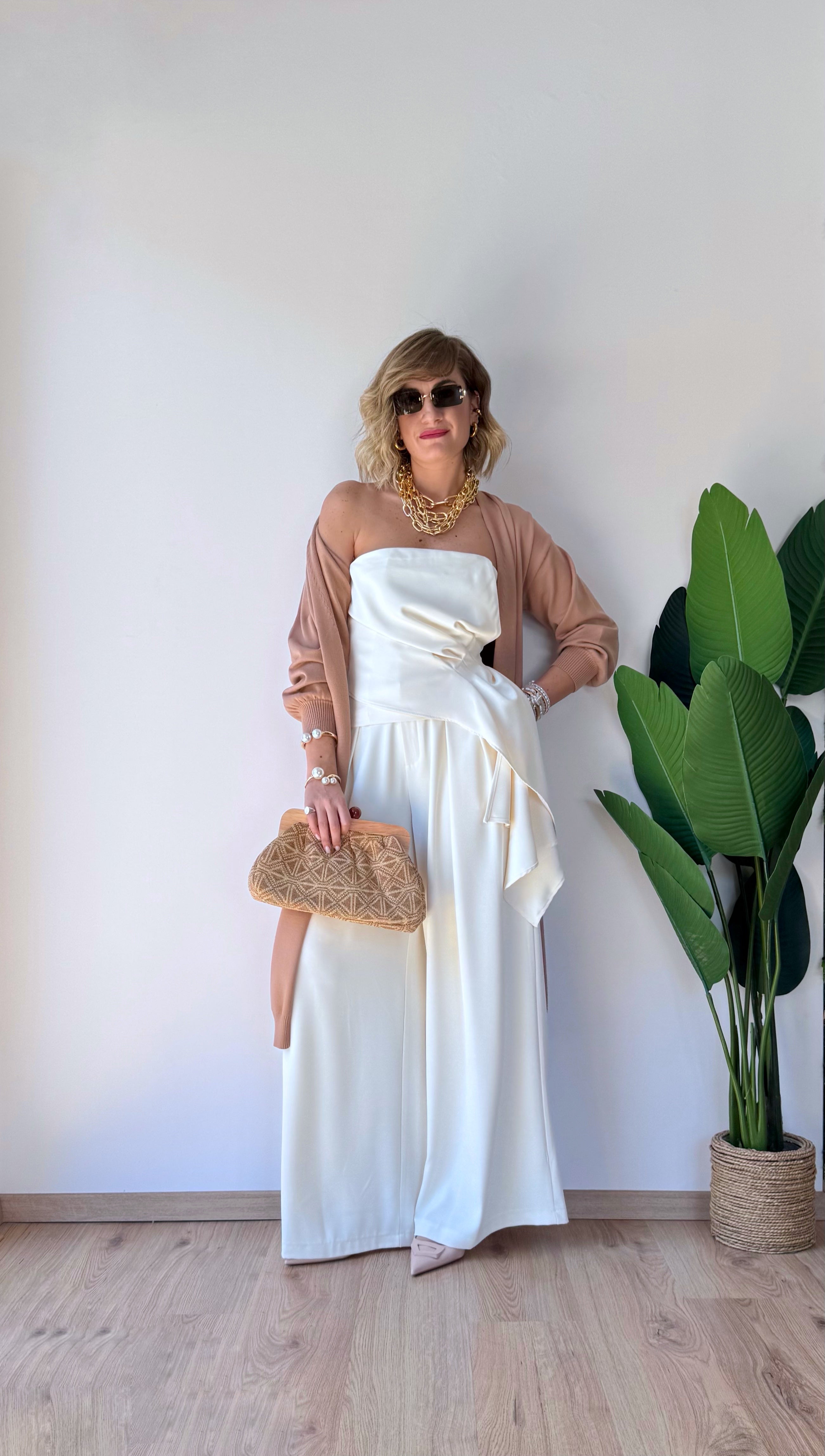 Pochette a fantasia con manico in legno