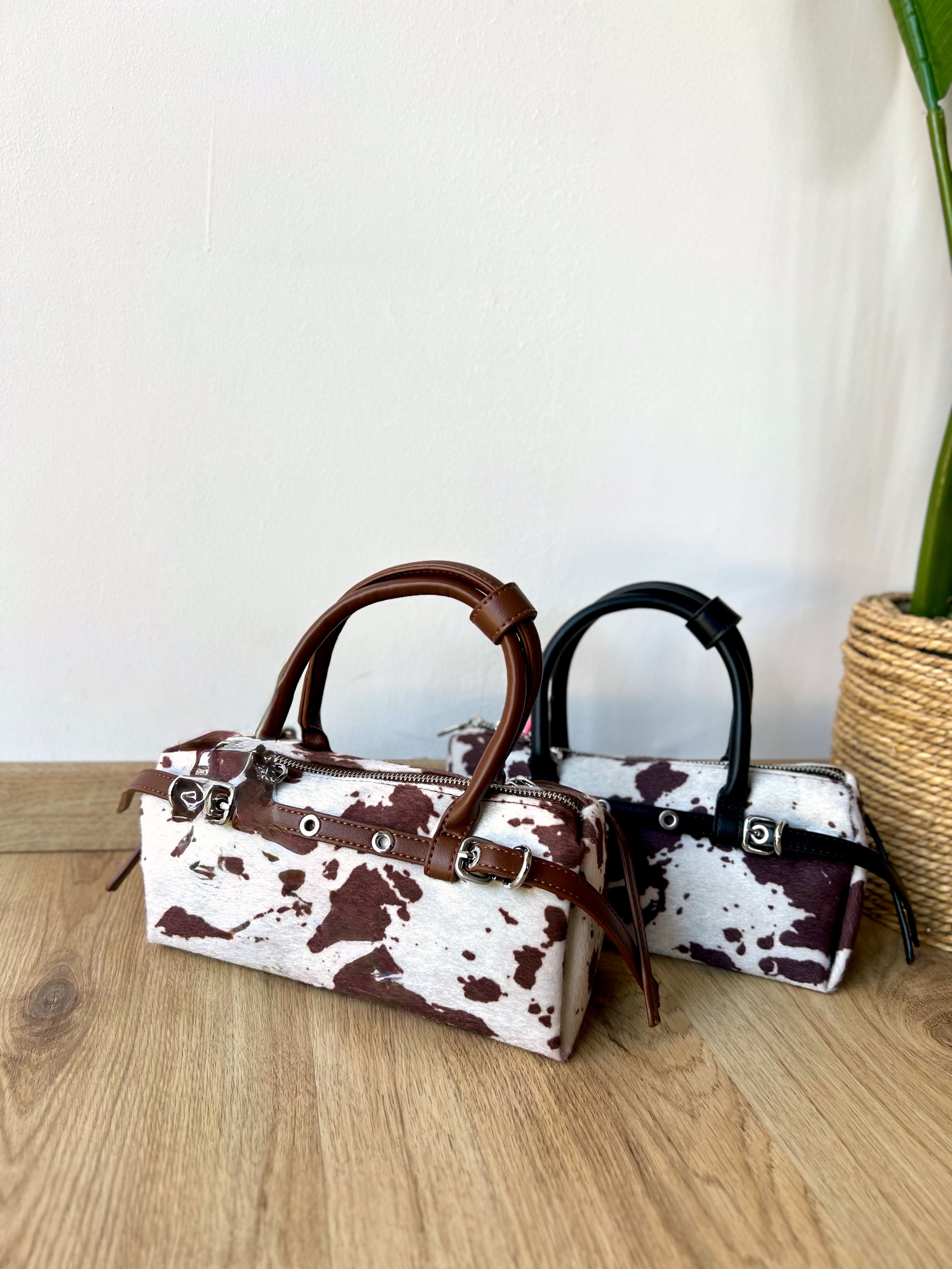 Pochette cow con manico