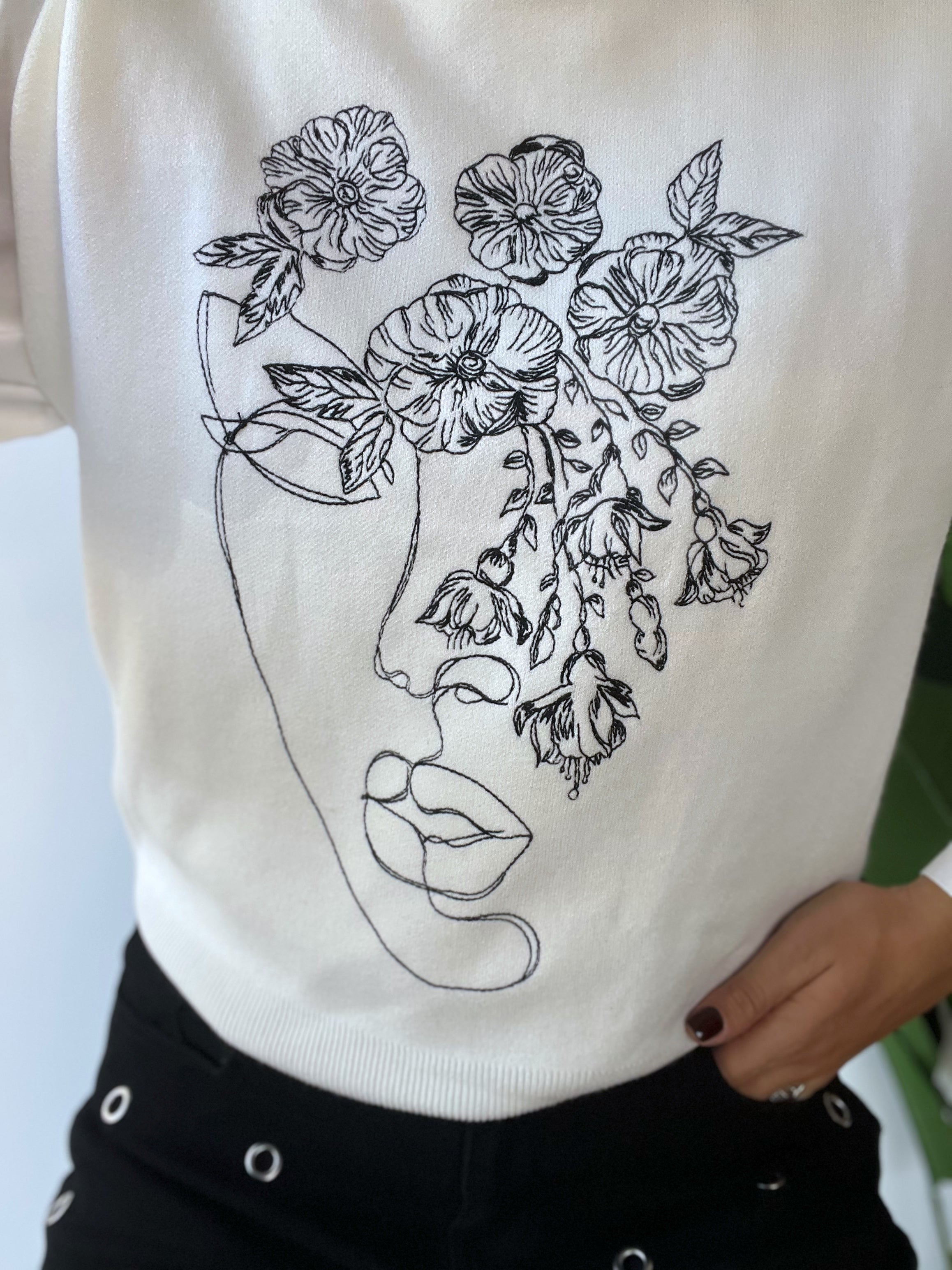 Gilet in maglina con volto ricamato