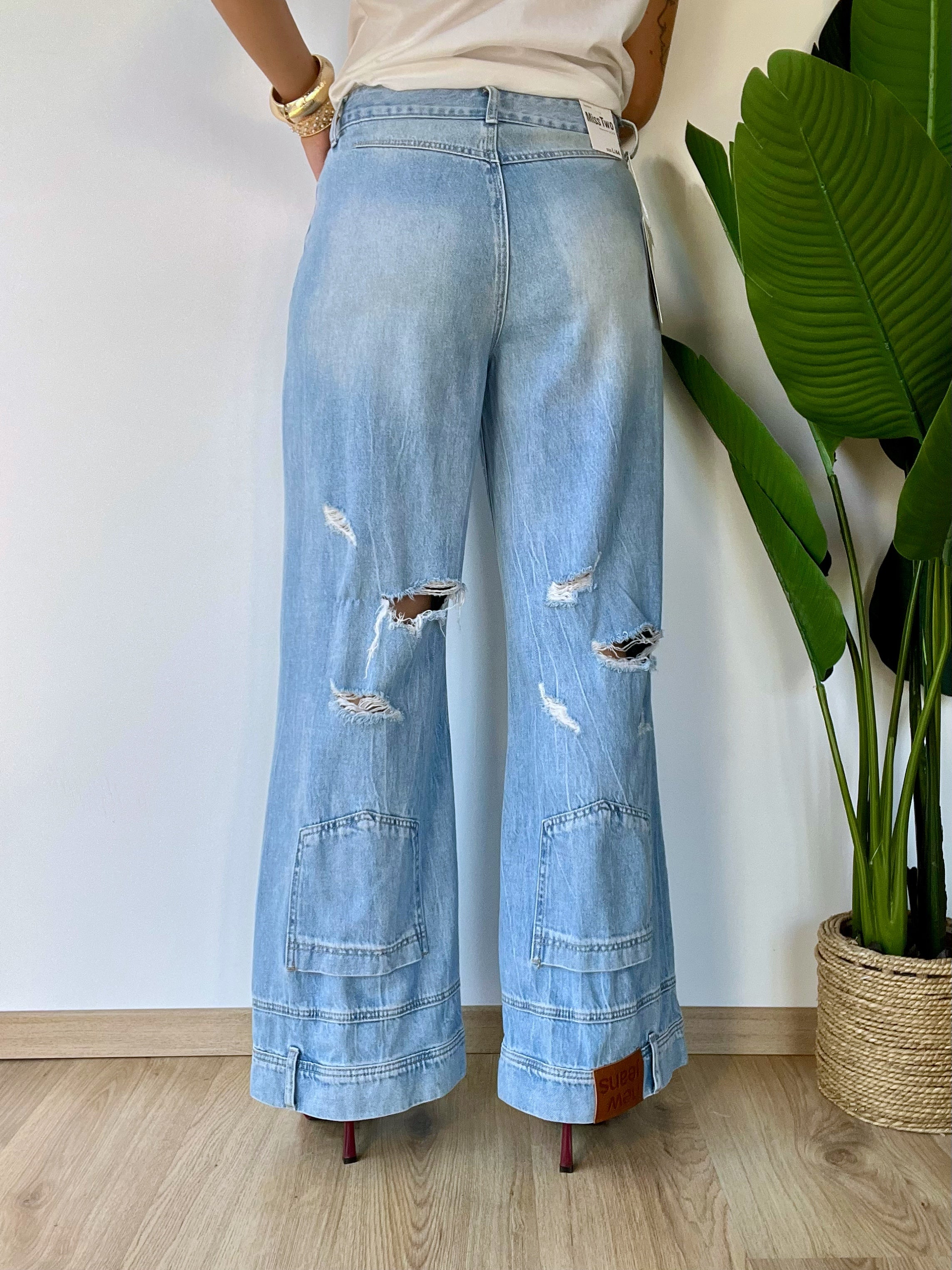 Jeans con vita al contrario