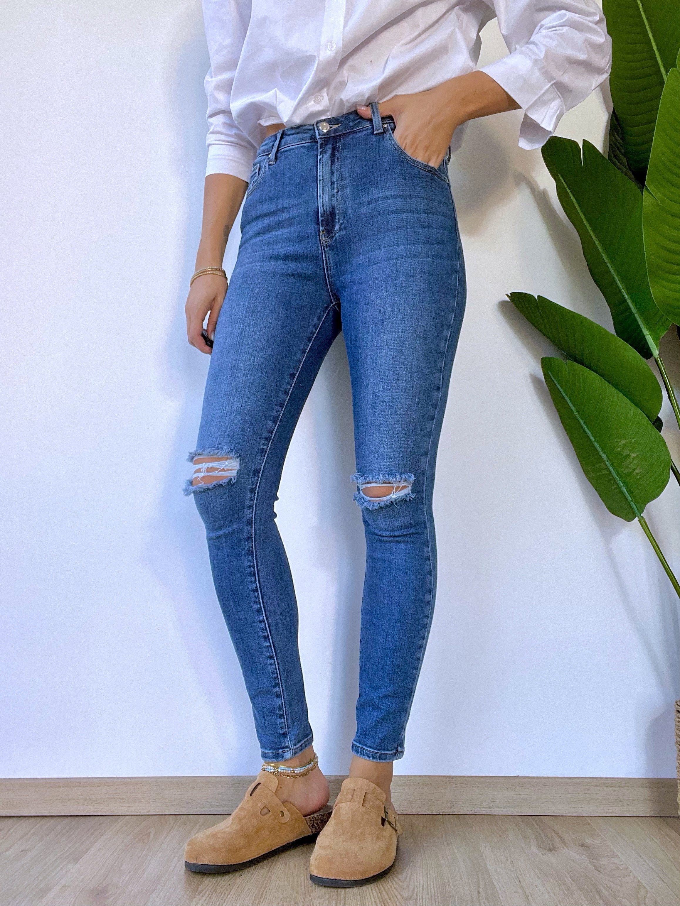 Jeans skinny con strappi store