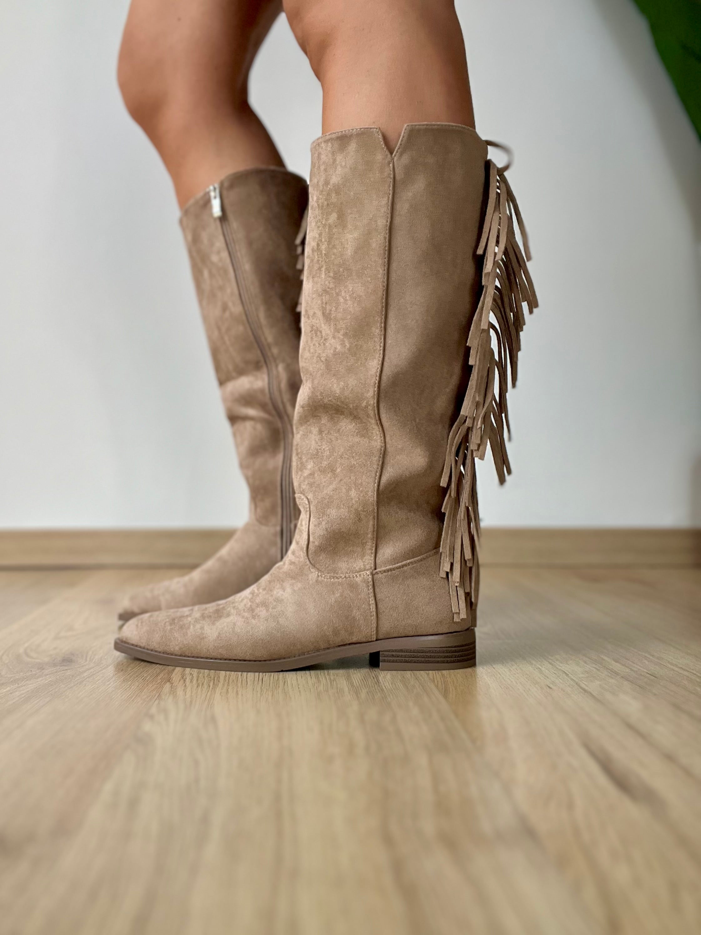 Texano beige con frange