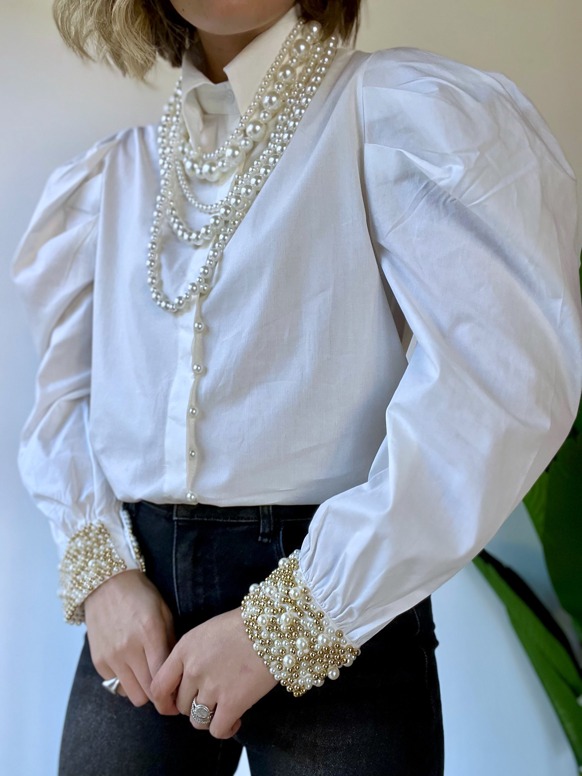 Camicia con maniche a palloncino e polsi con perle