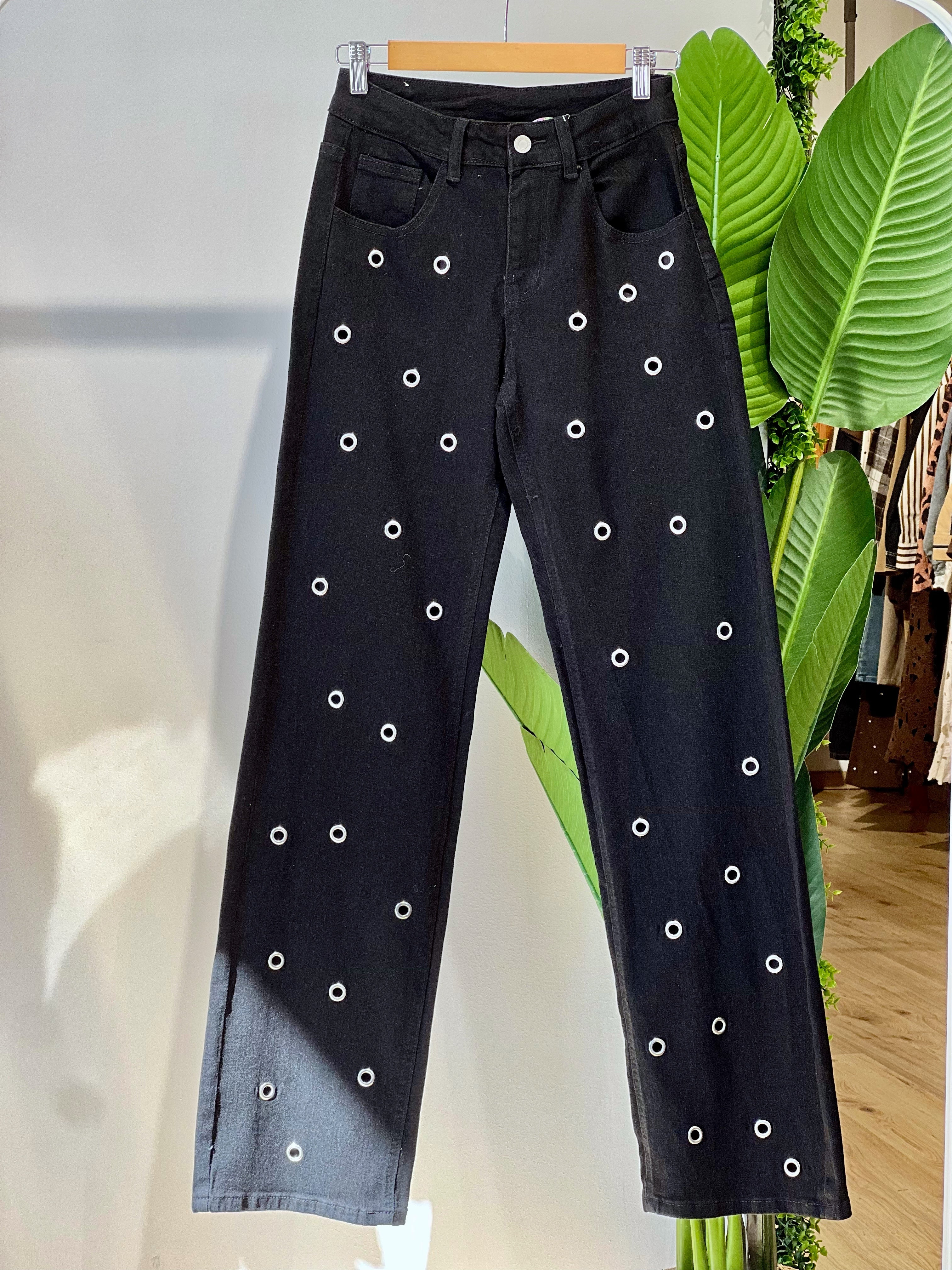 Jeans a palazzo nero con occhielli