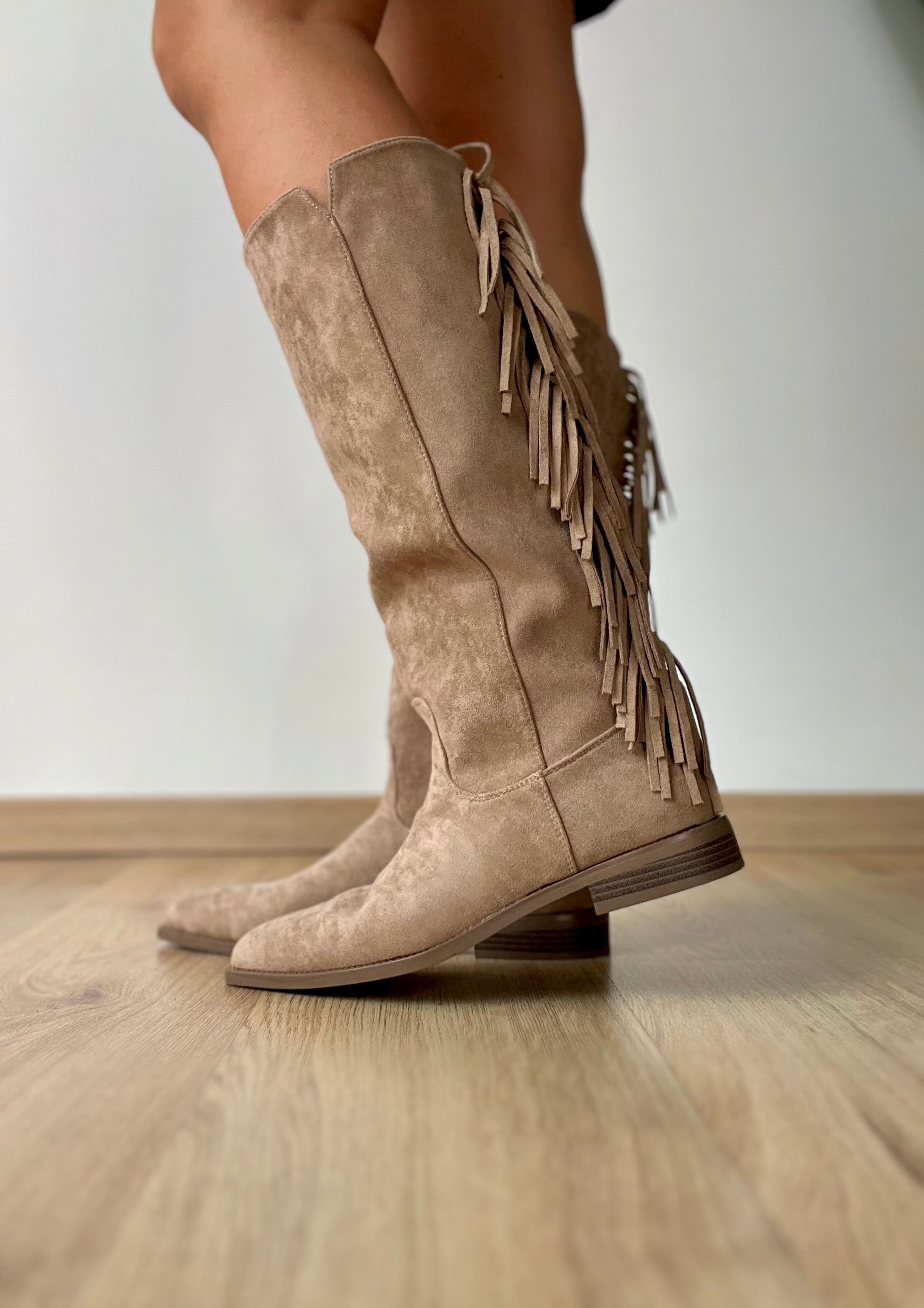 Texano beige con frange