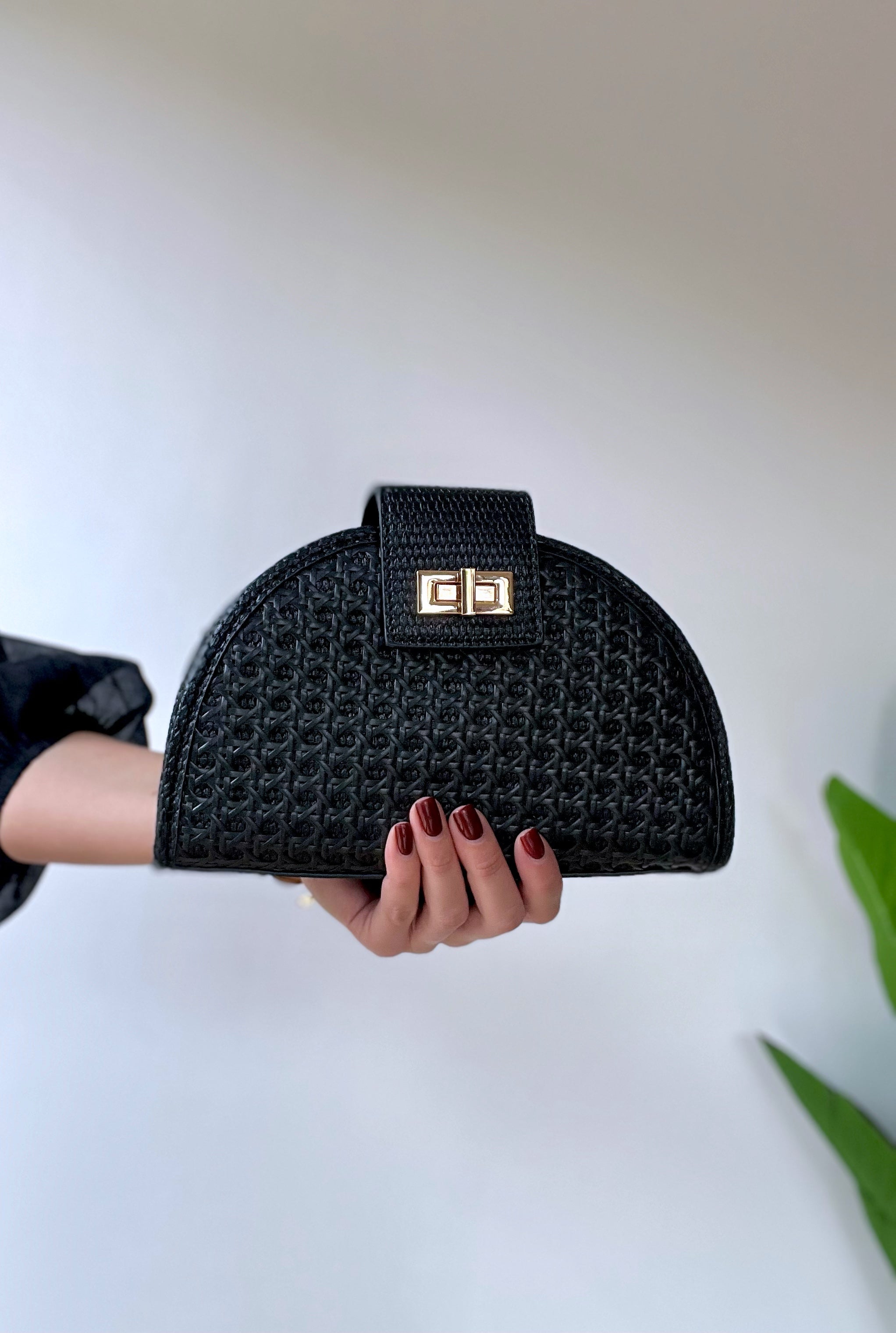 Borsa rigida mezzaluna intrecciata